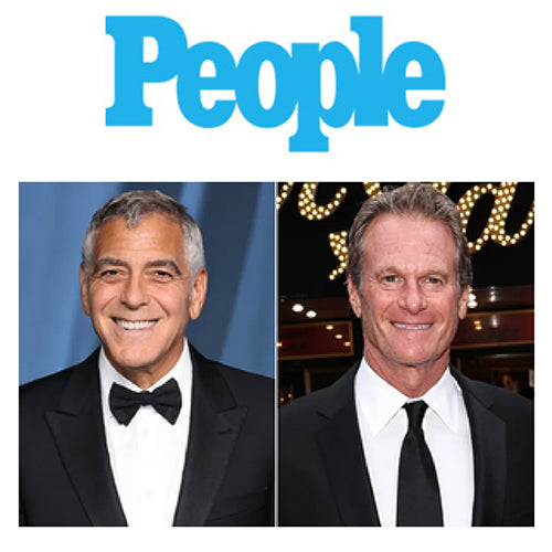 Side-by-side headshots of two smiling men (George Clooney and Rande Gerber) in black suits and ties beneath a blue magazine masthead
